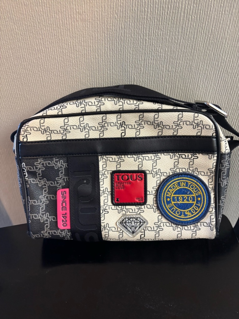TOUS Black & White Crossbody Bag with Colorful Patch Accents